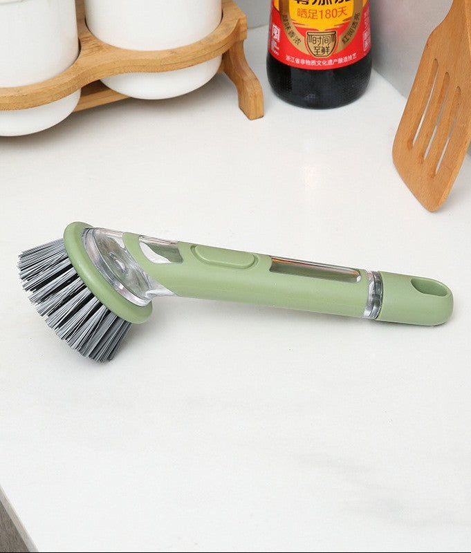 Spülbürste mit integriertem Flüssigkeitsbehälter